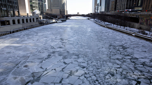 Ice floats on the Chicago River in Chicago.