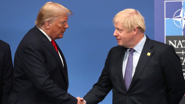 Boris Johnson shakes hands with US President Donald Trump during the annual NATO heads of government summit last year.