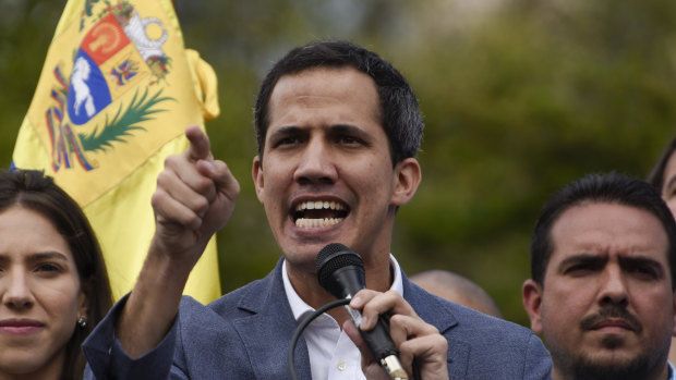 Juan Guaido, president of the National Assembly who swore himself in as the leader of Venezuela, speaks during a rally to propose amnesty laws for police and military, in the Las Mercedes neighbourhood of Caracas, Venezuela, on Saturday.