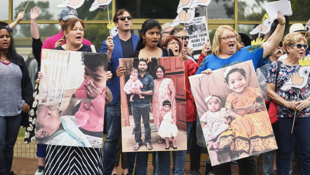 About 100 supporters of the Tamil family marched to Peter Dutton's office at the weekend.