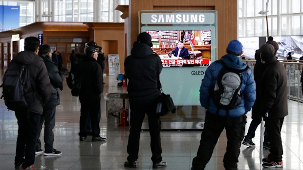 People in Seoul watching the North Korean leader's speech.