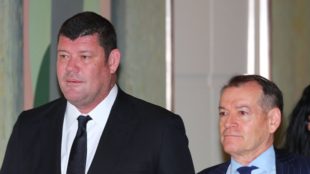 James Packer and John Alexander (right), arrive to attend the Crown Resorts annual general meeting in 2017. Both men have been called to give evidence. 