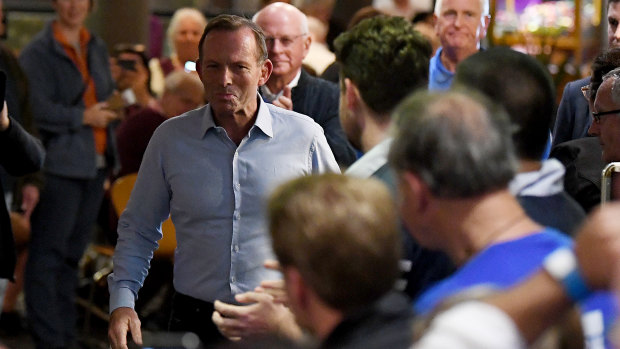 Triumphant loser: Tony Abbott concedes defeat in Warringah in front of an adoring Manly Leagues Club crowd. 
