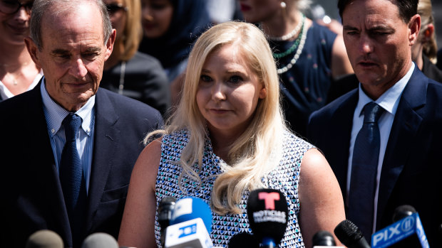 Virginia Giuffre speaking with members of the media in 2019.