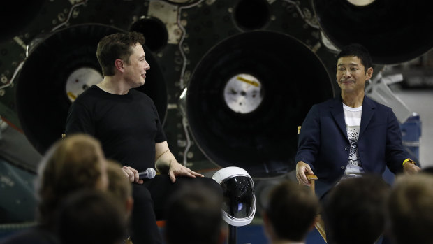 Elon Musk of SpaceX, left, and Yusaku Maezawa.