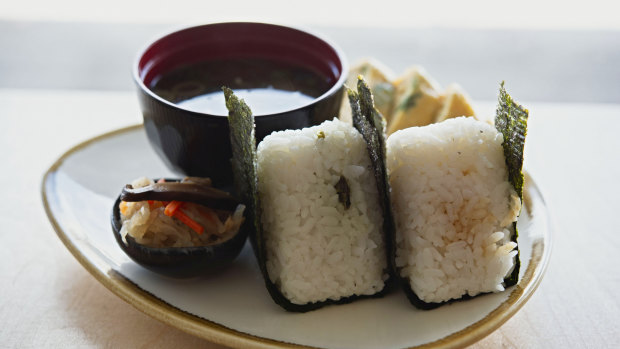 The Onigiri rice ball set comes with comes with miso soup, two seaweed-wrapped sushi rice balls and sweet and savoury rolled omelette.  