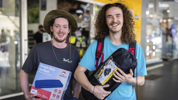 Friends James Bentley (left) and Andy Brown stocked up on camping gear at the post-Christmas sales before heading to a camping music festival over New Year’s Eve.