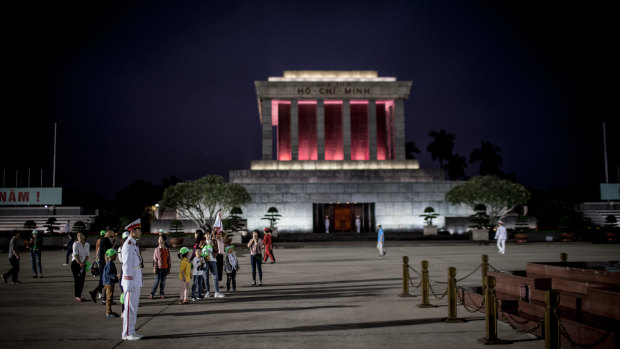 A soldier stands guard in front of the Ho Chi Minh Mausoleum at Ba Dinh Square in February. 