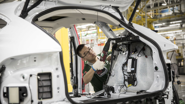 An electric vehicle (EV) being assembled at a plant in China. More than two-thirds of future demand growth for copper may come from EVs and their infrastructure.