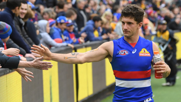 Tom Liberatore does a victory lap for the faithful after the Bulldogs' thrilling win over the Hawks in round two.