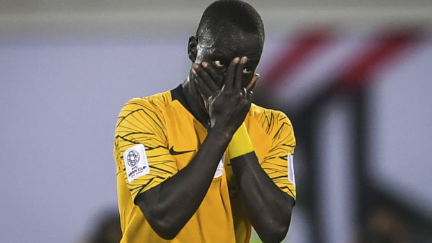 Peace of mind: Awer Mabil sends a message after scoring against Syria on Tuesday.