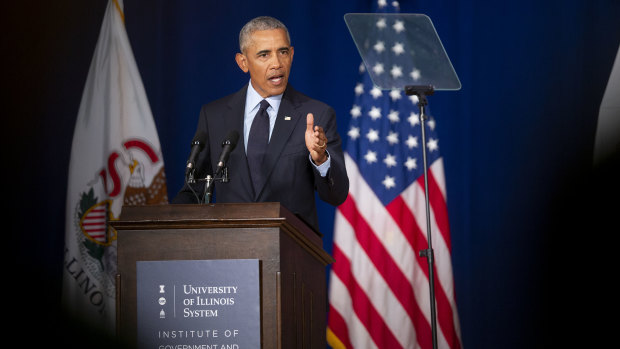 Former president Barack Obama kicked off a campaign blitz against Donald Trump at the University of Illinois in Urbana, on Friday,