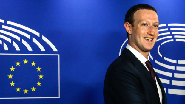 Facebook chief executive Mark Zuckerberg arrives at the EU Parliament in Brussels.