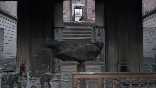 A five-tonne meteorite remains inside the entrance of the National Museum on Monday, following a fire that gutted the 200-year-old institution. 