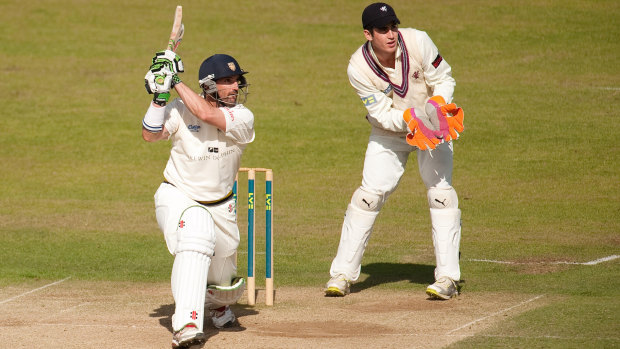 Michael Di Venuto (left), with Durham in his playing days, has coached Surrey to the English County cricket title.