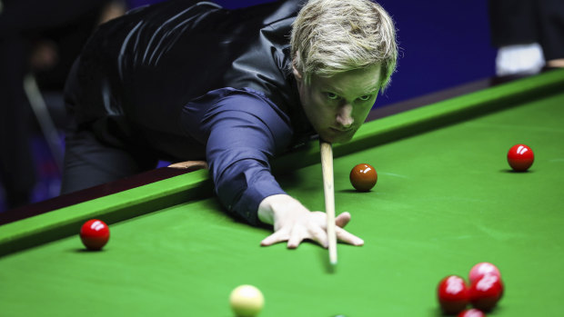 Neil Robertson of Australia at the table.