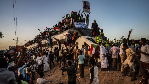 A train carrying Sudanese demonstrators from al-Atbara arrives in Khartoum in late April.
