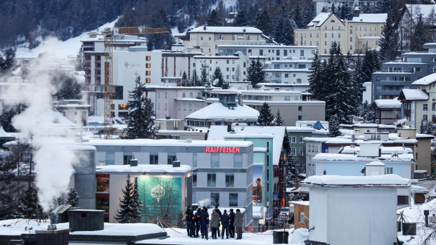 Security personnel stand on a rooftop for a briefing ahead of the World Economic Forum in Davos, Switzerland. Europeans are waiting to see if Donald Trump reprises his role as 'Tariff Man'.