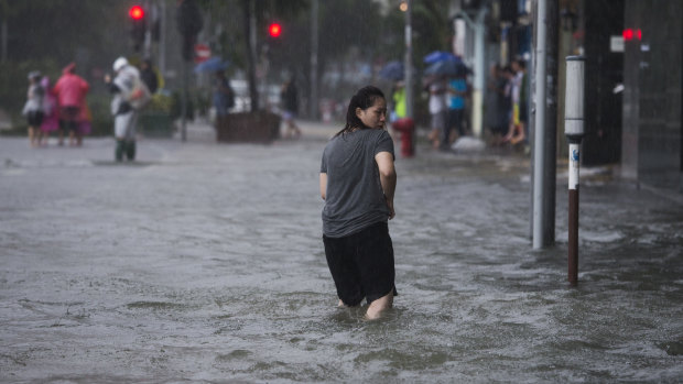 Typhoon Mangkhut belted Hong Kong with mammoth gales and rain as it moved along the coast of China's Guangdong province.