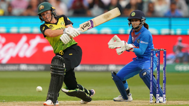 On the charge: Australian opener Alyssa Healy on her way to a rapidfire 75 off 39 balls.