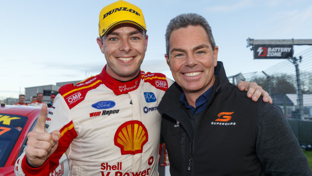 Overtaking manoeuvre: Race winner Scott McLaughlin (left) is greeted by former Supercars champion Craig Lowndes after the Kiwi driver bettered Lowndes' record of most wins in a season during the ITM Auckland SuperSprint Event 11 at Pukekohe Park Raceway in New Zealand. 