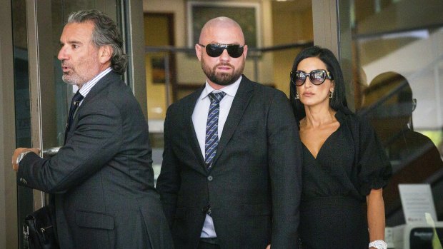 Daniel Gatto, 38, middle, leaves Melbourne Magistrates Court on Monday with his wife Atlal.