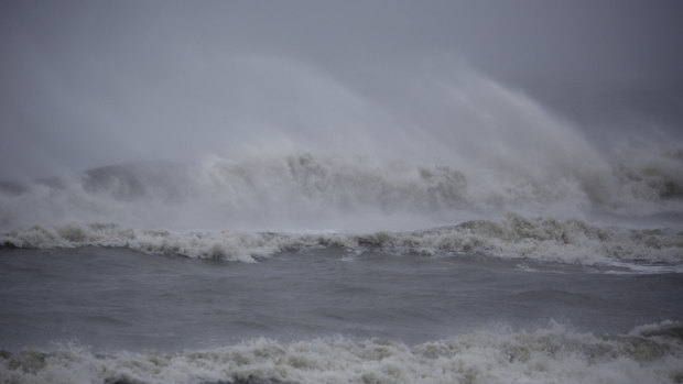 Waves break on the beach during Hurricane Dorian in Folly Beach, South Carolina.