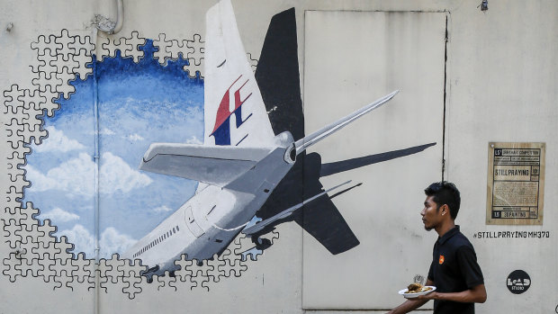 A mural for the missing MH370 outside Kuala Lumpur.