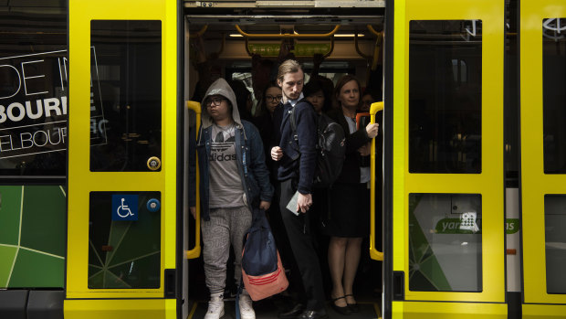 Commuters traveling on inner-city tram