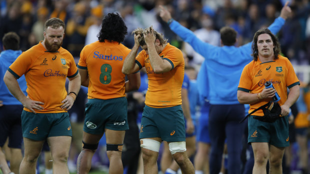 Wallabies players after their one-point defeat to Italy.