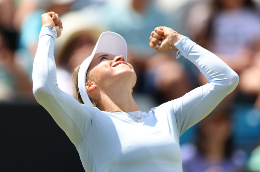 Putintseva celebrates her maiden grasscourt title.