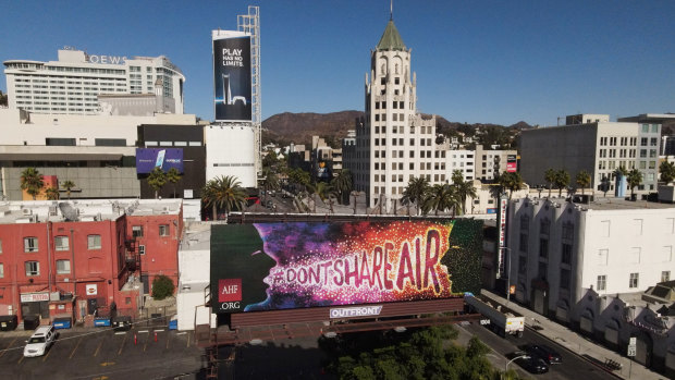 A "Don't Share Air" billboard at Hollywood and Highland in Los Angeles, California, US.