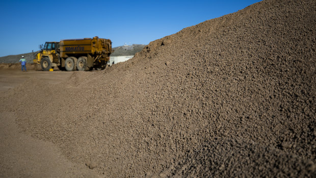 A mountain of crushed ore awaits processing by America's only rare earths producer, MP Materials, in California.