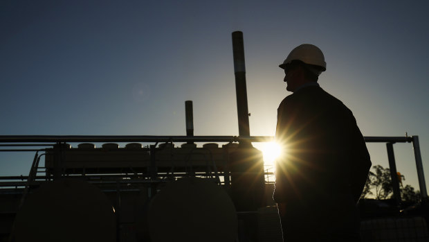 A Santos operator looks on at the company's Wilga Park power station near Narrabri in northern NSW.