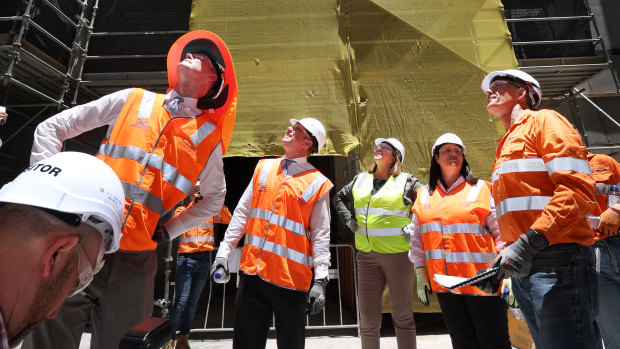 Construction at Cross River Rail’s Roma Street Station is looking up, with Mark Bailey, Steven Miles, Catherine King and Grace Grace intent on inspecting the progress.