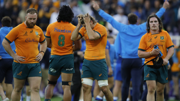 Wallabies players after their one-point defeat to Italy.