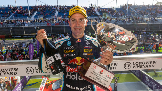 Jamie Whincup celebrates his success in the Superloop Adelaide 500.