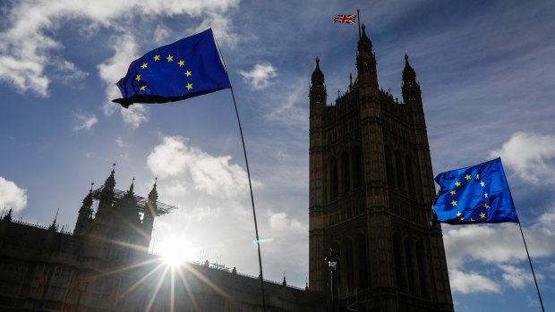 EU flags fly outside the Houses of Parliament in London, near where the military is planning for a no deal Brexit.