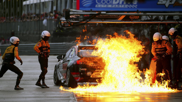 Burn out: Supercars driver Nick Percat’s car catches fire during late race pitstop.