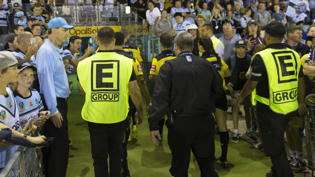 Referees were escourted off the field by security guards following the heavily-penalised match.