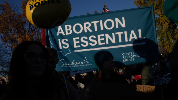 Pro-choice demonstrators protest outside the US Supreme Court at the start of one of the most significant abortion rights cases in decades. 