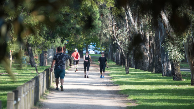 Park rangers patrol Melbourne's green spaces.