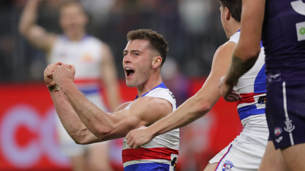 Josh Dunkley celebrates a goal against the Dockers.