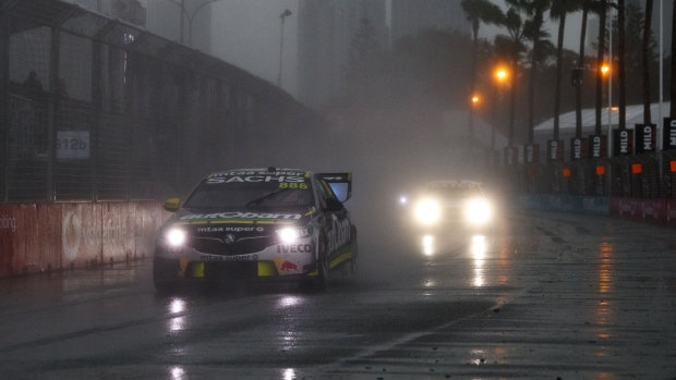 Dark and damp:: Craig Lowndes and Steve Richards win the Pirtek Enduro Cup in challenging conditions.