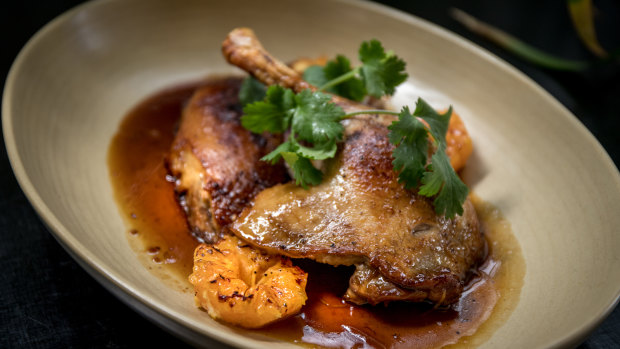 The Golden Pig cooking school has opened a bar and restaurant, serving dishes including duck. 