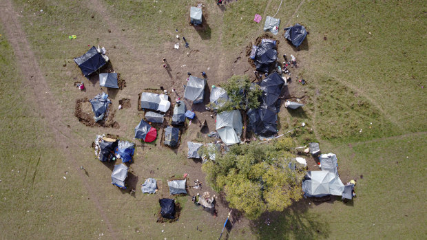 An aerial photograph shows a makeshift camp housing migrants mostly from Afghanistan, in Velika Kladusa.