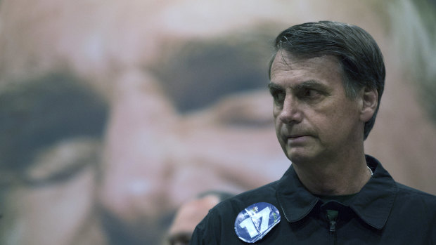 Presidential candidate Jair Bolsonaro has urged his supporters to avoid political violence.