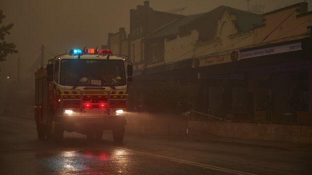 An RFS truck travels through Bundanoon as rain begins to fall in January.