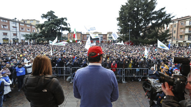 Matteo Salvini, leader of the League party, center, speaks during a campaign rally in Emilia Romagna.