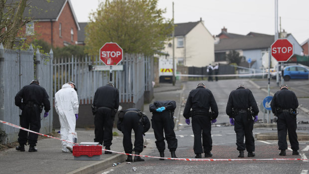 Police at the scene in Londonderry, Northern Ireland, where 29-year-old journalist Lyra McKee was shot and killed. 